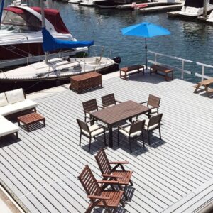 Boat pier with tables and lounge chairs